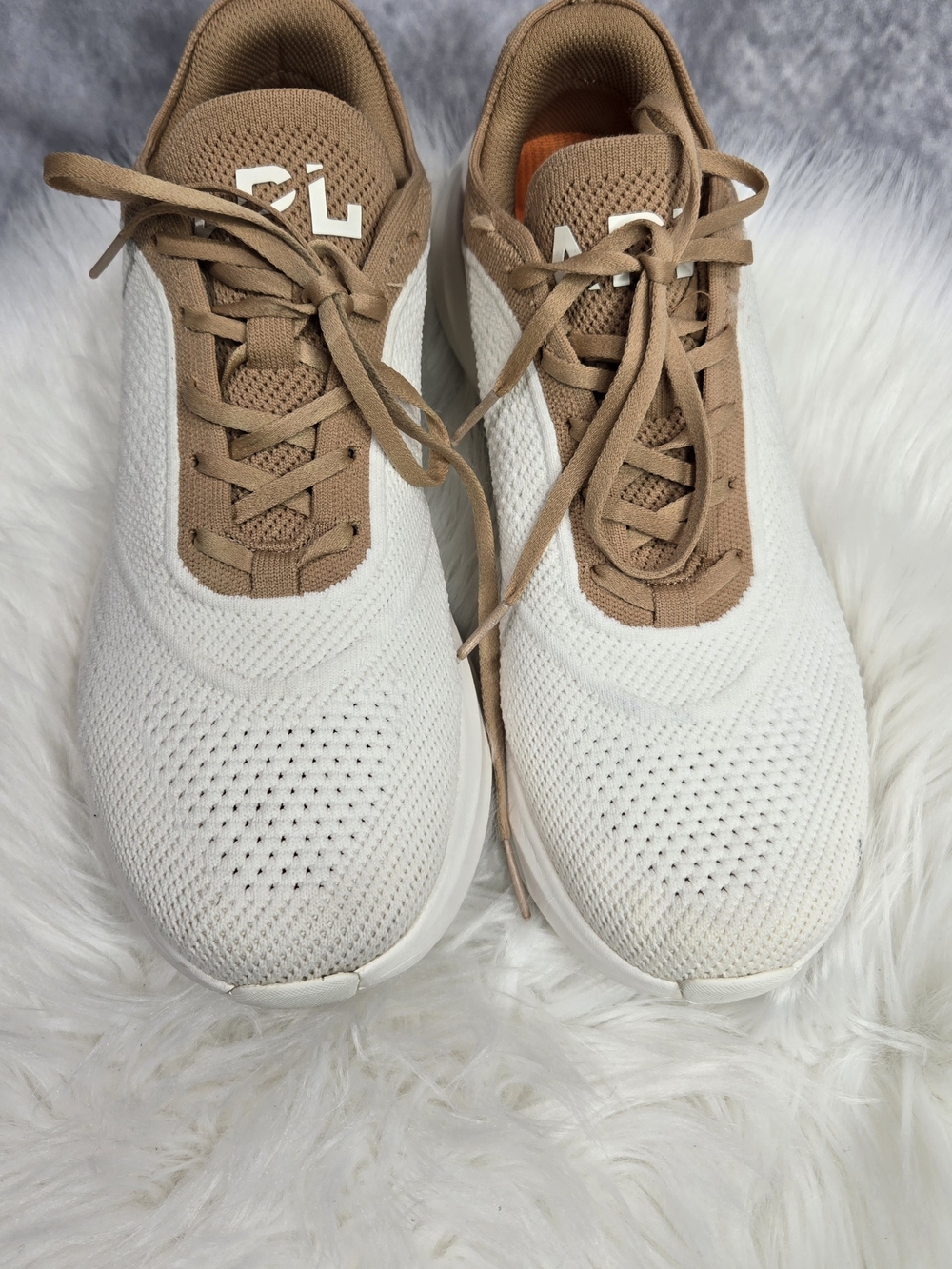 APL TechLoom Dream sneakers in white and tan.